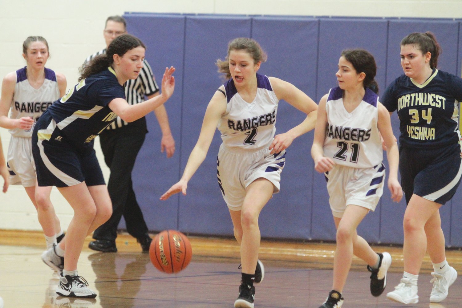 Kaetlyn Riley brings the ball up the court during last week’s matchup at home.